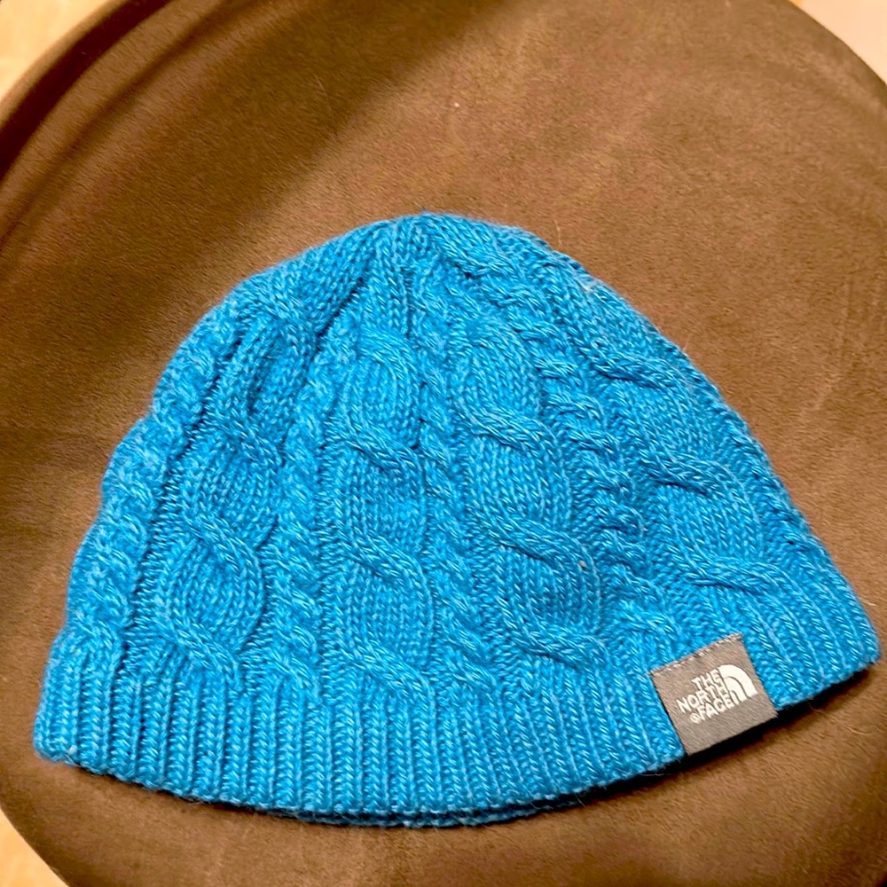 The north face blue hat and fleece inside